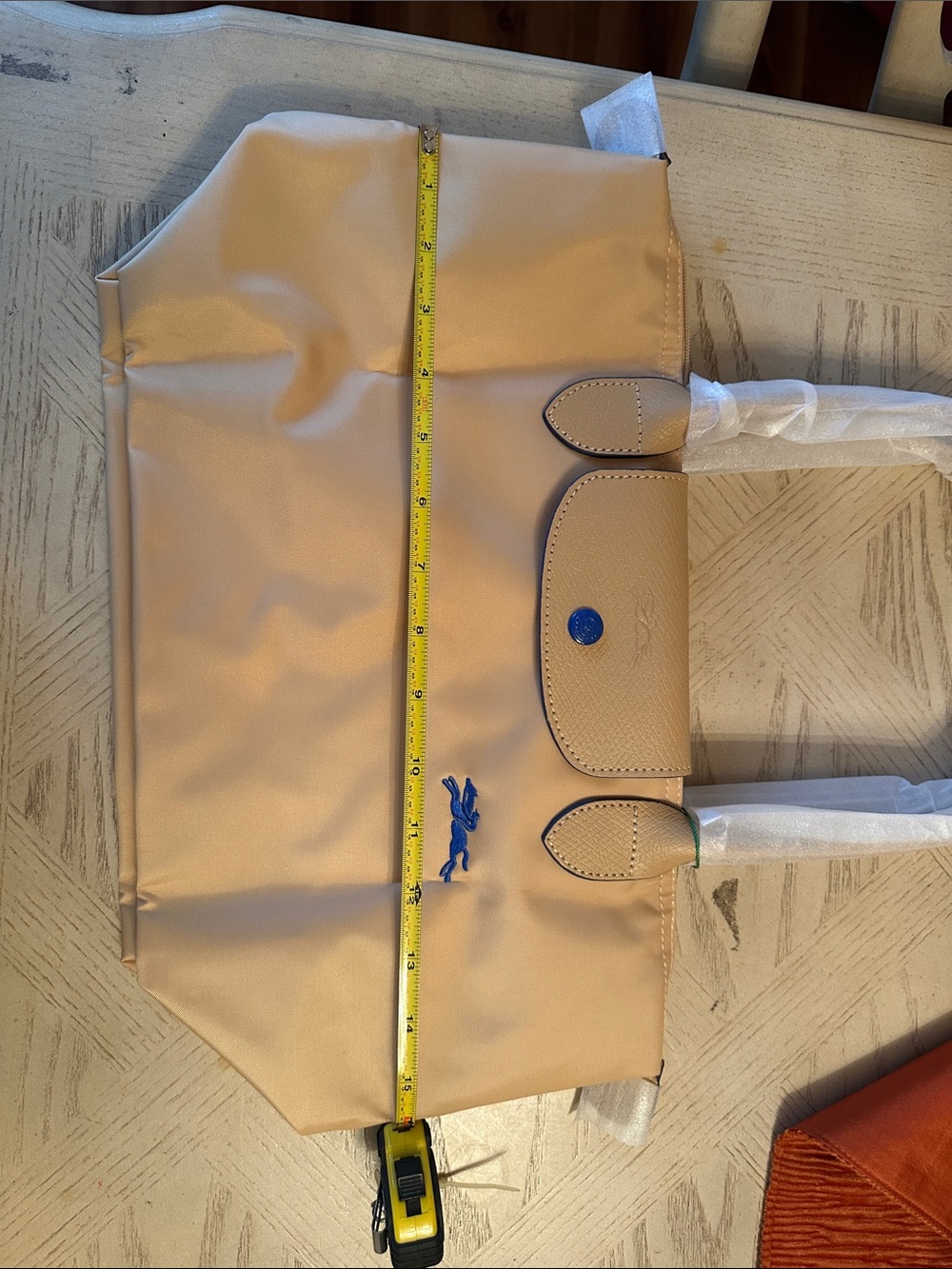 Stylish Crossbody Bag in Beige with Blue Snap - Picture 6 of 8